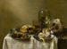 Martwa natura z odwróconą srebrną miską, wypiekami i obraną cytryną na stole - Willem Claesz Heda — widok dzieła