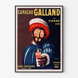 Wintage plakat reklamowy Curaçao Galland, w wąskiej ramie na jasnej ścianie.