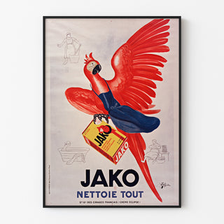 Wintage reklamowy plakat Jako nettoie tout, w cienkiej ramie na jasnej ścianie.