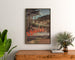 Plakat turystyczny vintage – Saint-Honoré-les-Bains, PLM, oprawiony nad drewnianą komodą, między roślinami.