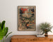 Plakat vintage Cannes, Grand Hôtel des Pins, oprawiony nad drewnianą komodą, między roślinami.