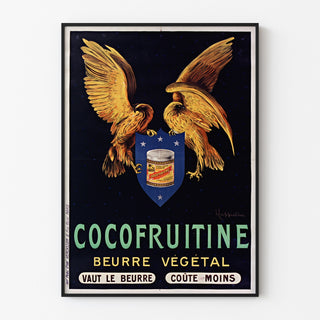 Plakat vintage Cocofruitine, masło roślinne, oprawiony w cienką ramę na jasnej ścianie.