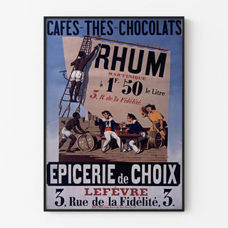 Plakat vintage Épicerie Lefèvre, cafés et chocolats, oprawiony w cienką ramę na jasnej ścianie.