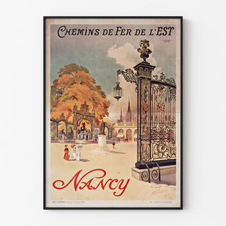 Vintage plakat Nancy, chemins de fer de l’Est, w cienkiej ramie na jasnej ścianie.