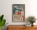 Plakat vintage Vernet-les-Bains, Canigou, oprawiony nad drewnianą komodą między roślinami.