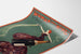Plakat vintage Woman and Wine, Princess’s Theatre, na zakrzywionej kartce, widok w perspektywie.