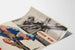Plakat vintage militarystyczny „Give 'Em Both Barrels” – dekoracja ścienna retro