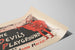 Plakat vintage The Devil’s Playground w czerwieni i czerni — widok dzieła