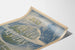 Plakat vintage The Review of Reviews - Lipiec, ilustrowany kosmosem i konstelacją Lwa